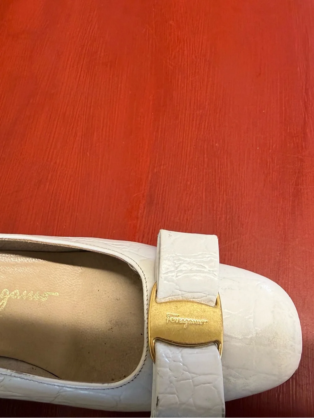 Salvatore Ferragamo White Leather Vara Bow Flats with Gold Accent